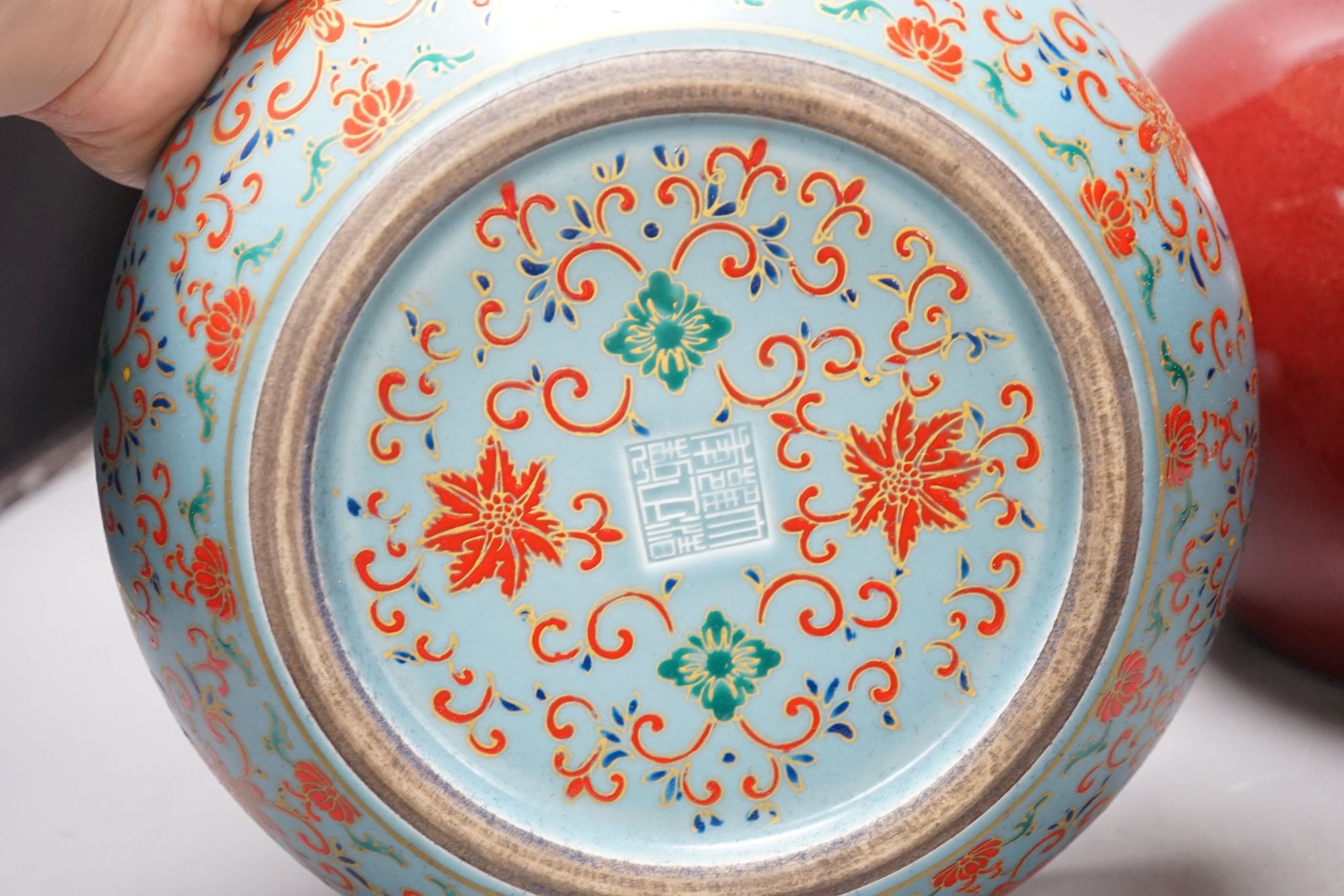 A Chinese oxblood vase, crackle glaze vase and enamelled bowl